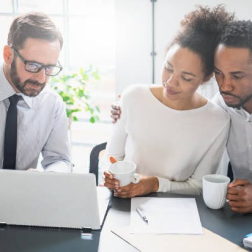 Family couple consultations with a lawyer or insurance agent. Law and insurance.